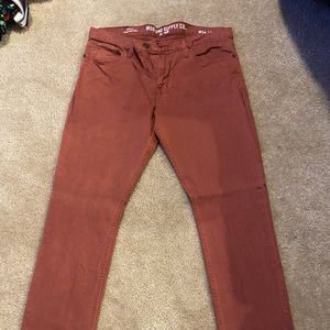 Burnt orange slim jeans
